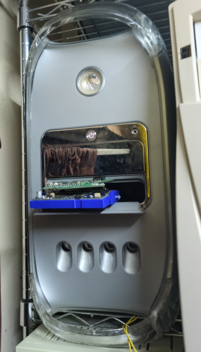 Front view of the PowerMac G4 Mirror Drive Doors. A ZuluIDE is awkwardly sticking out of one of the mirror drive doors.