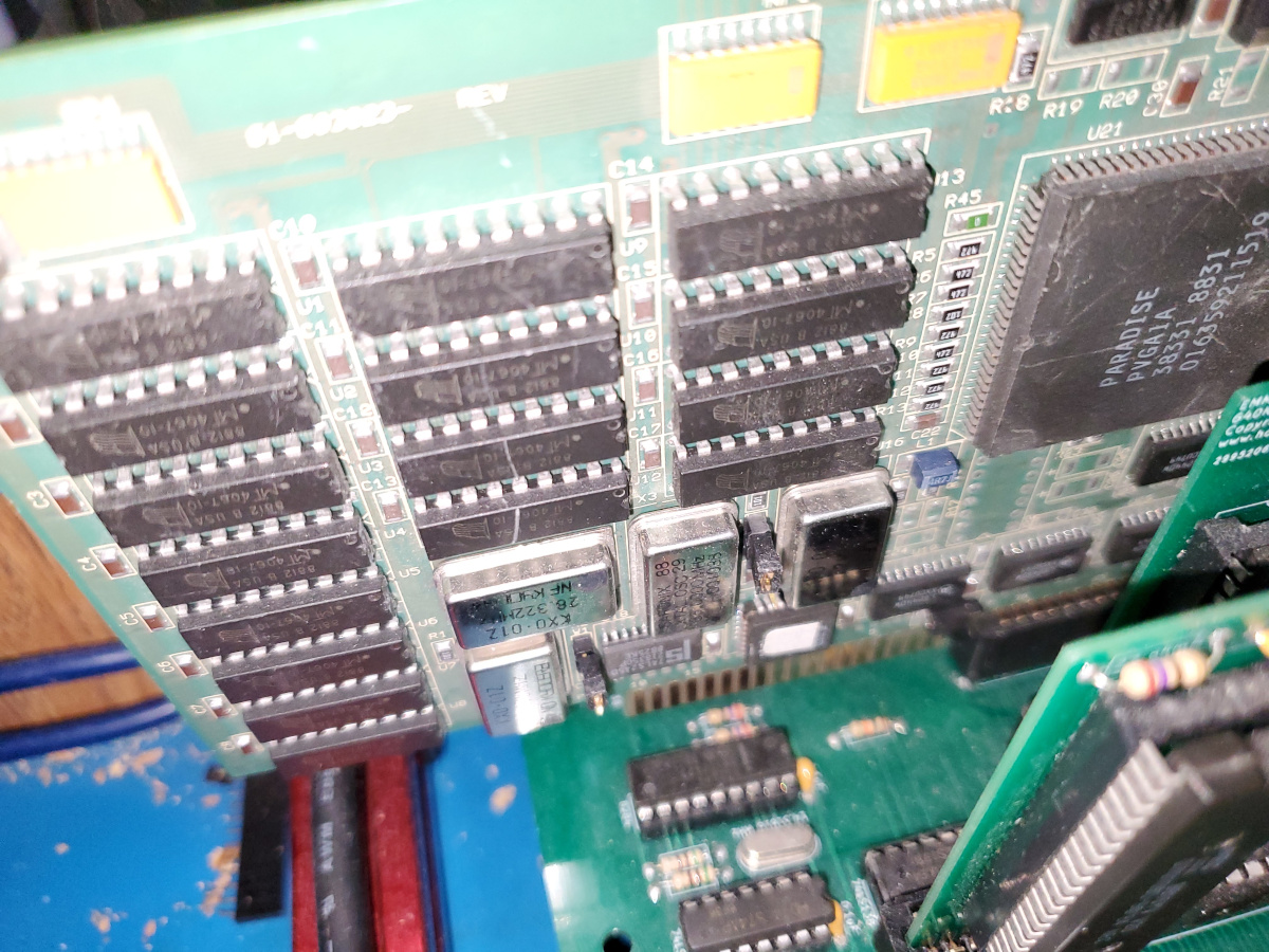 Closeup of the rear of the VGA card inserted in one of the slots on the XT8088 backplane. It is a 16-bit ISA card, so the part behind the notch is hanging free from the slot.